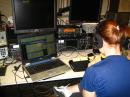 Rebecca Rich, KB0VVT, enjoys a snack while operating the 2010 ARRL CW Sweepstakes at W1MX, the club station at the Massachusetts Institute of Technology. [Photo courtesy of Rebecca Rich, KB0VVT]