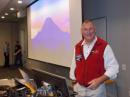 Curt Black, WR5J, explained how the RAMROD bicycle race network would work. Mt Rainier in the background gives an idea of the topography involved.