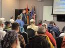 A capacity crowd fills the training room at Newington VFD Company #1. [Sierra Harrop, W5DX, photos]