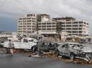 Damaged vehicles litter the parking lot of St John's Hospital in Joplin, Missouri., after a tornado hit the Southwest Missouri city on Sunday, May 22. According to reports, the tornado hit the hospital head-on. [Mike Gullett/AP, Photo]