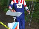 George Neal KF6YKN, of Maspeth, New York earned his second medal for the USA by finishing third in the category for men ages 50-59 on his 80 meter run. This photo shows him at the finish of the 2 meter competition at the 2010 USA ARDF Championships in Ohio. [Joe Moell, K0OV, Photo]