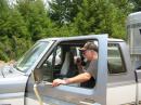 Hap Bullard, KQ6YV, on the radio at the Equine Evacuation staging area.