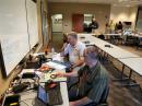 Larry Arave, W7LRY, and John Cook, WA7NZE, both of Fort Collins, helped support disaster communications from the Larimer (Colorado) County Emergency Operations Center during the High Park fire. [ Photo by Rob Strieby, W0FT ]